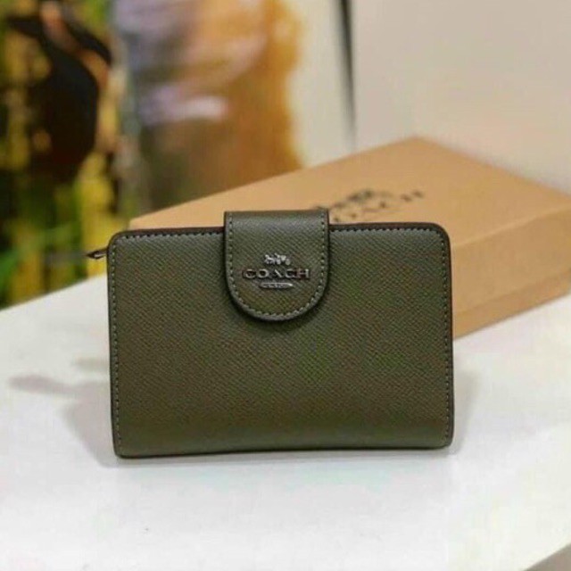 Ví cầm tay coach size M mẫu mới 2021