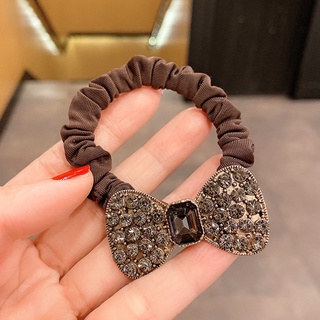 cột tóc mặt đính đá