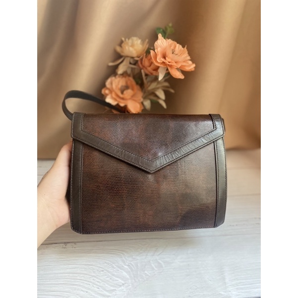 Túi đeo chéo da kì nhông