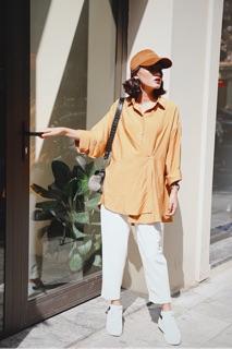 Sơ mi đính khuy lệch