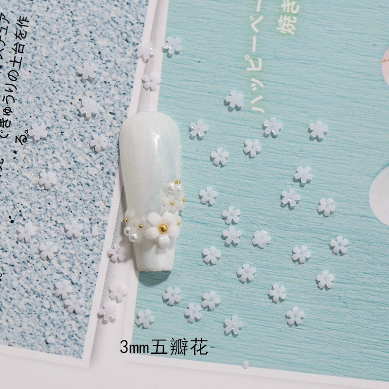 Hoa sứ trắng trang trí nail móng tay ( lẻ 1 túi)