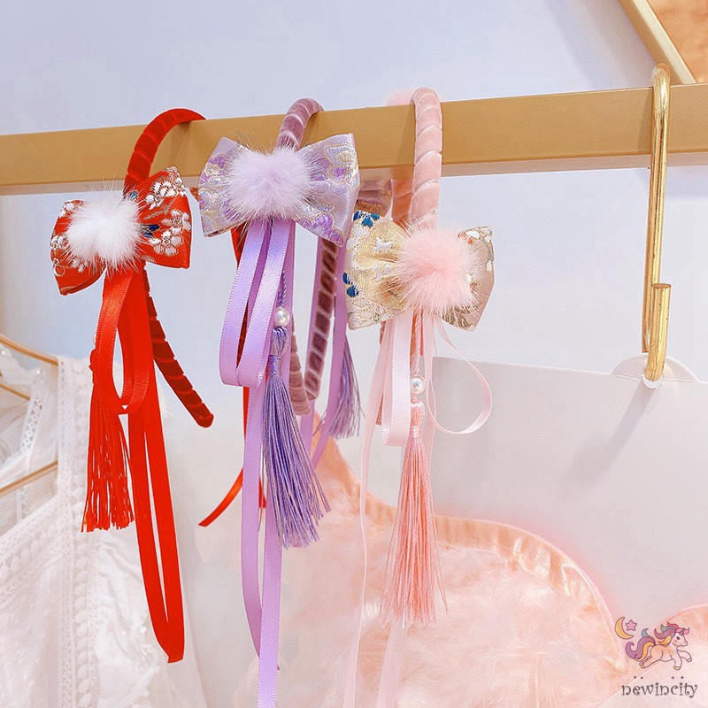 Băng đô cài tóc đính quả bóng lông phong cách retro xinh xắn cho bé gái