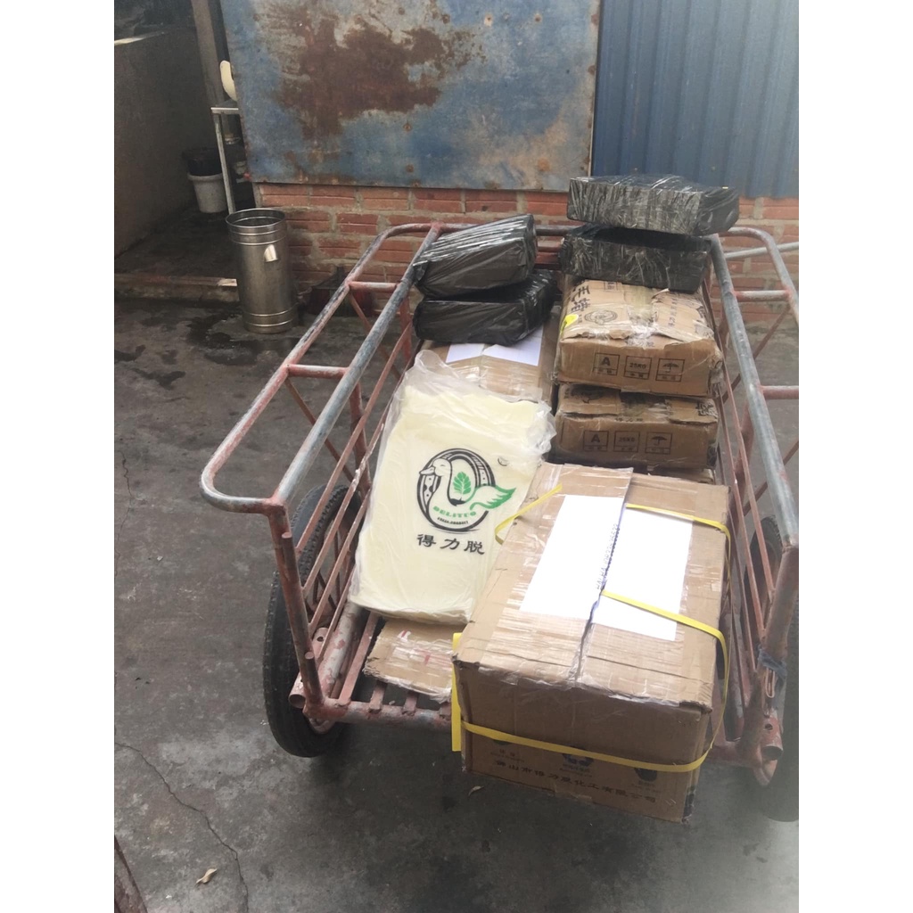 Bột lọc lông vịt dính trong sáp , bột lọc lông vịt , sáp vịt gói 1kg