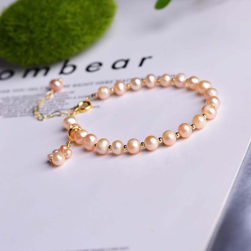 Vòng tay ngọc trai 7ly màu cam mix bi - NT41 - Ngọc Trai Trường Thịnh