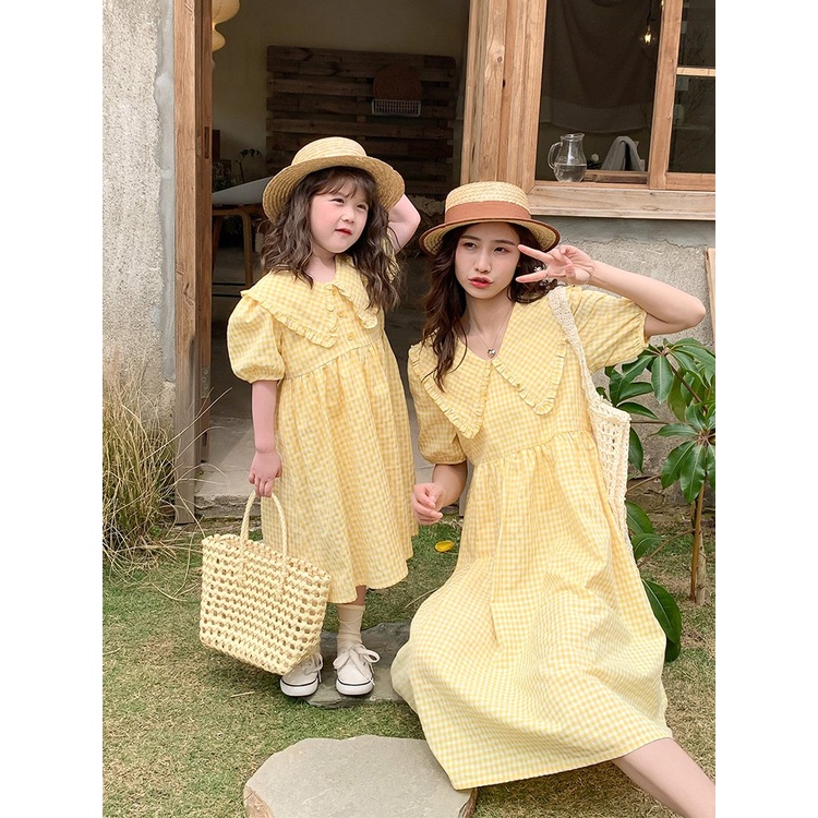 Set váy đôi vàng tươi họa tiết kẻ ca rô tay bồng dành cho mẹ và bé