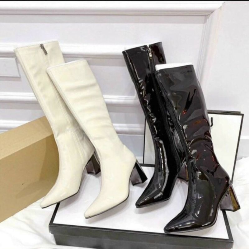 Boots da bóng mũi nhọn dáng lửng gót gương có cả size 34 39 (chat trước với shop check size ạ)