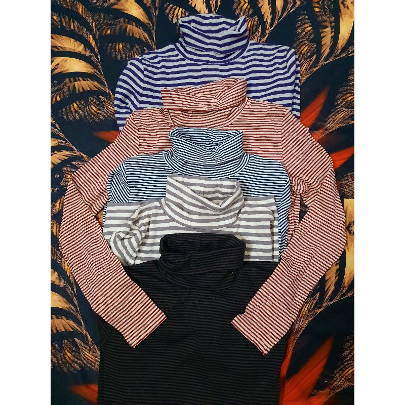 Áo thun cổ lọ dài tay . Hàng xuất