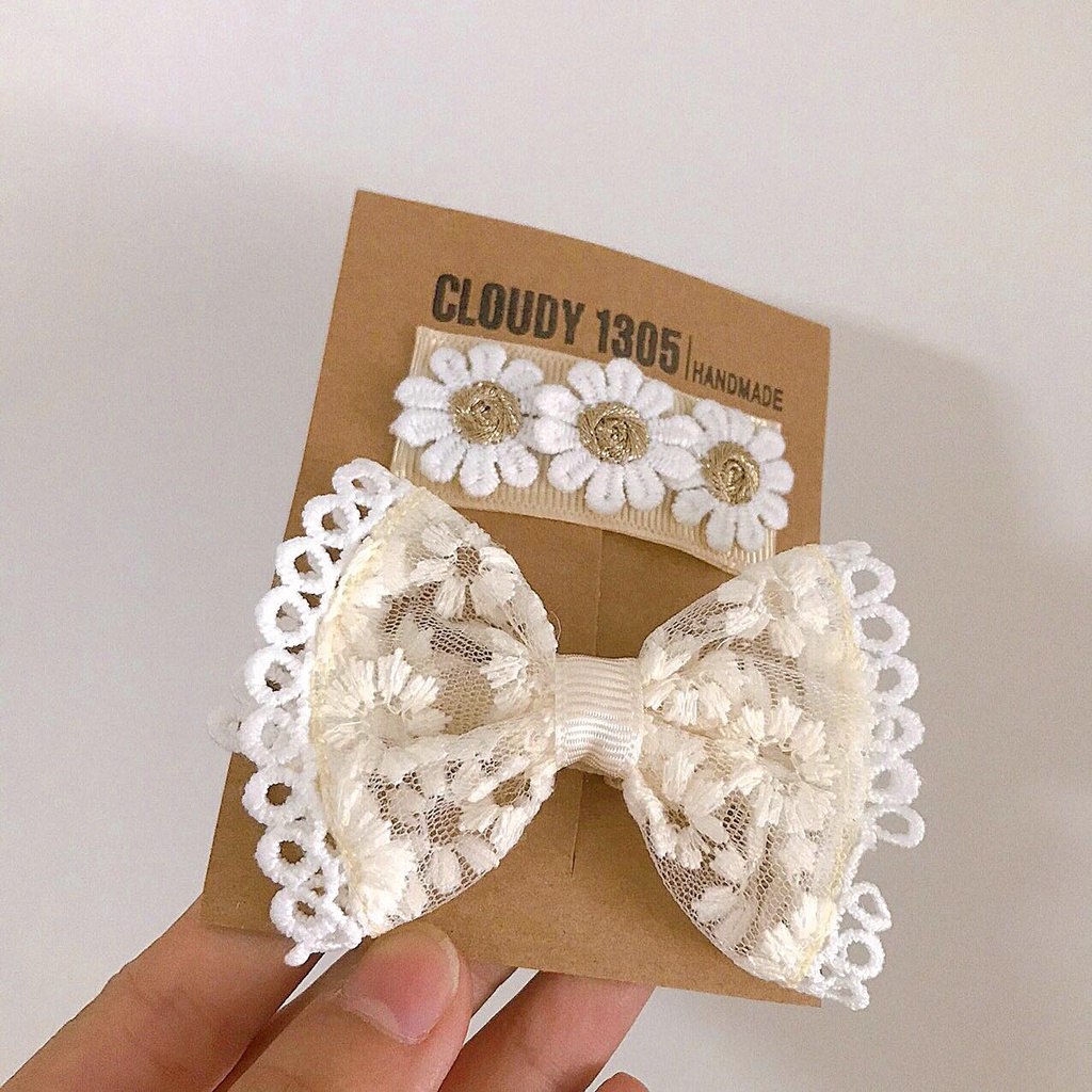 Set kẹp nơ và hoa cúc