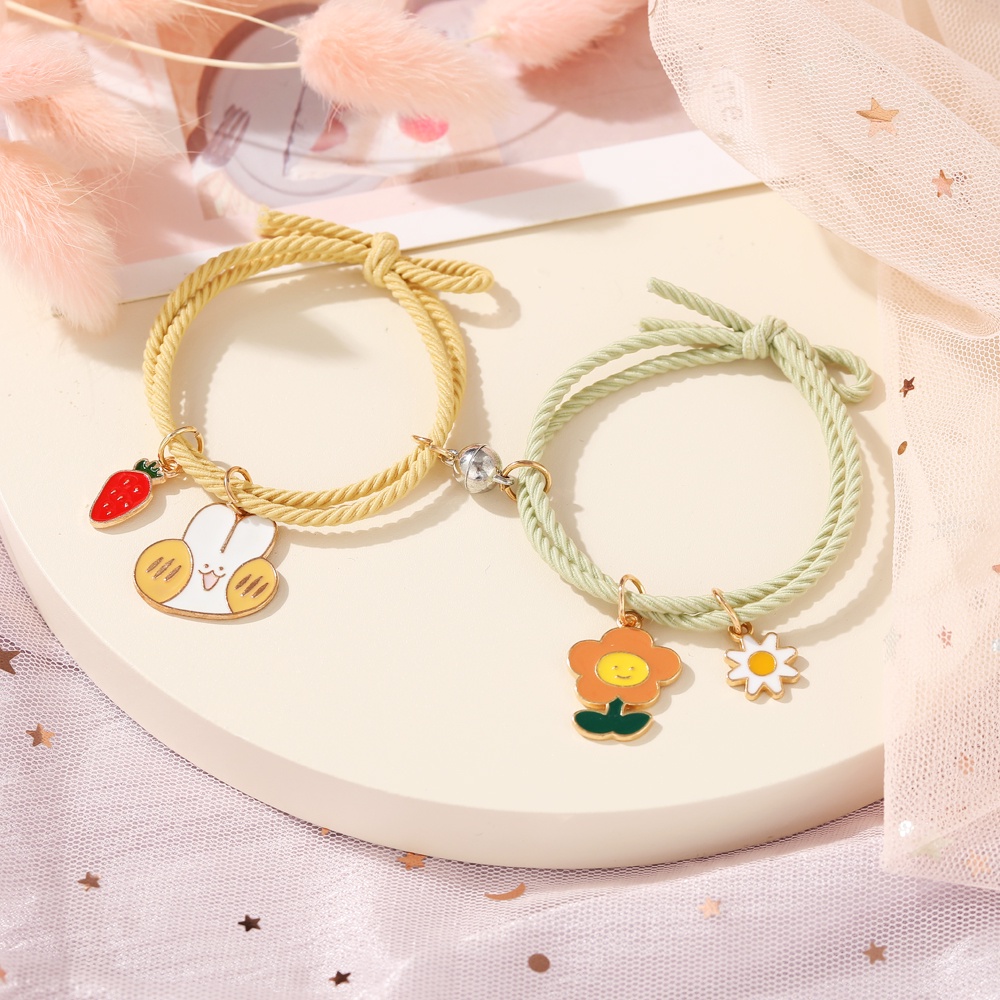 Set 2 vòng tay thời trang hàn quốc cho cặp đôi kiêm thun cột tóc