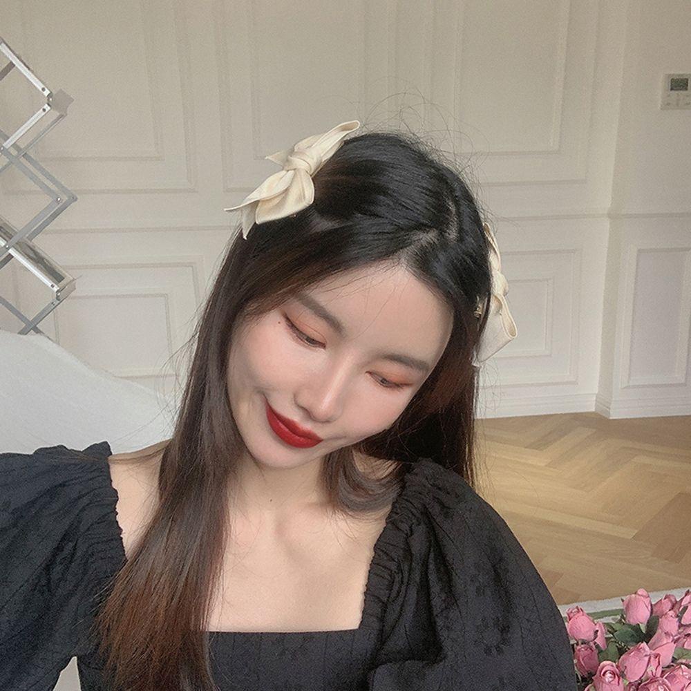 Kẹp Tóc Hình Nơ Phối Tua Rua Màu Sắc Trơn Thanh Lịch Cho Nữ