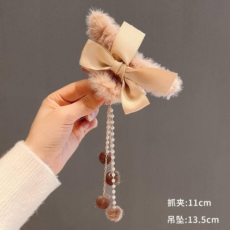 Kẹp gấp tóc nhung nơ tua rua