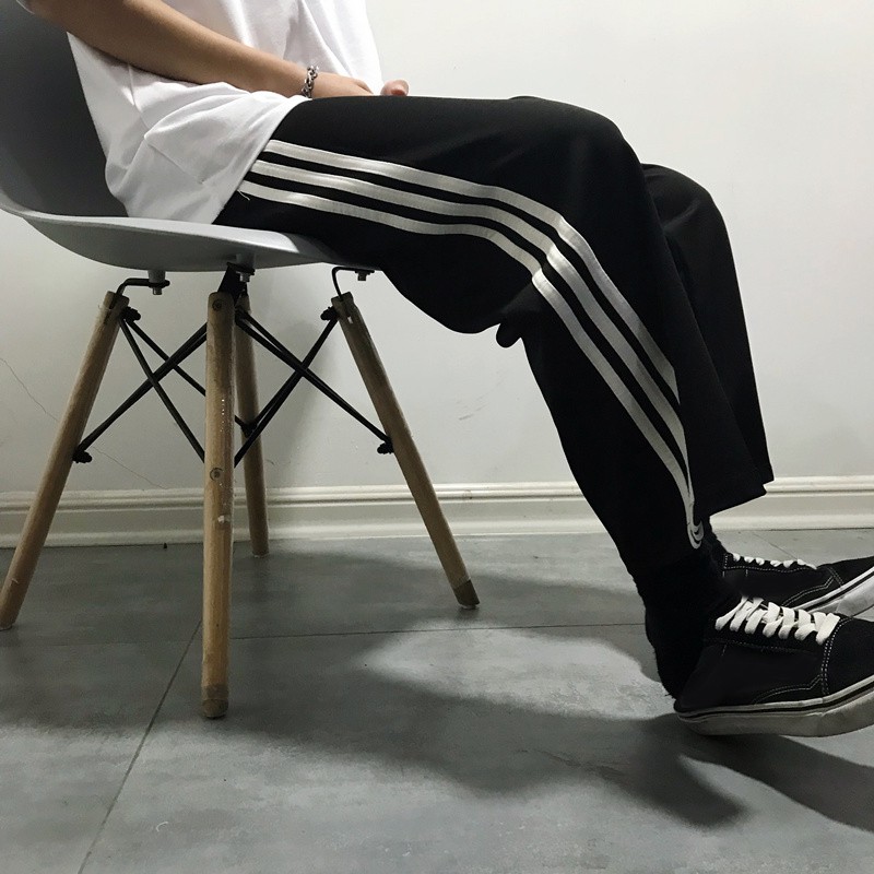 Quần vải thể thao unisex chun rút có 3 sọc dài phong cách Harajuku