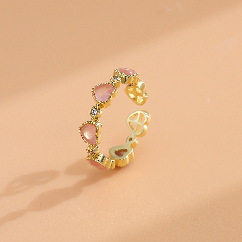 1 Nhẫn Đeo Ngón Tay Hình Trái Tim Khoét Lỗ Đính Đá zircon Thời Trang Cho Nữ