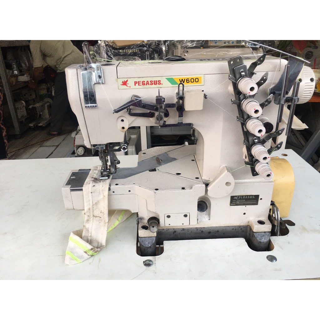 MÁY KANSAI VIỀN PEGASUS ĐẦU TÚM W600 XÀI MOTOR ĐIỆN TỬ