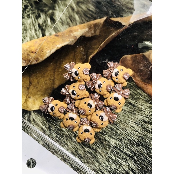 Gấu Bột Nail, Gấu Nơ Nail