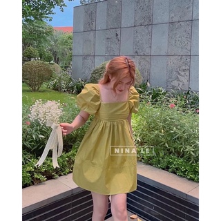 Đầm bbd tay phồng nơ lưng xanh