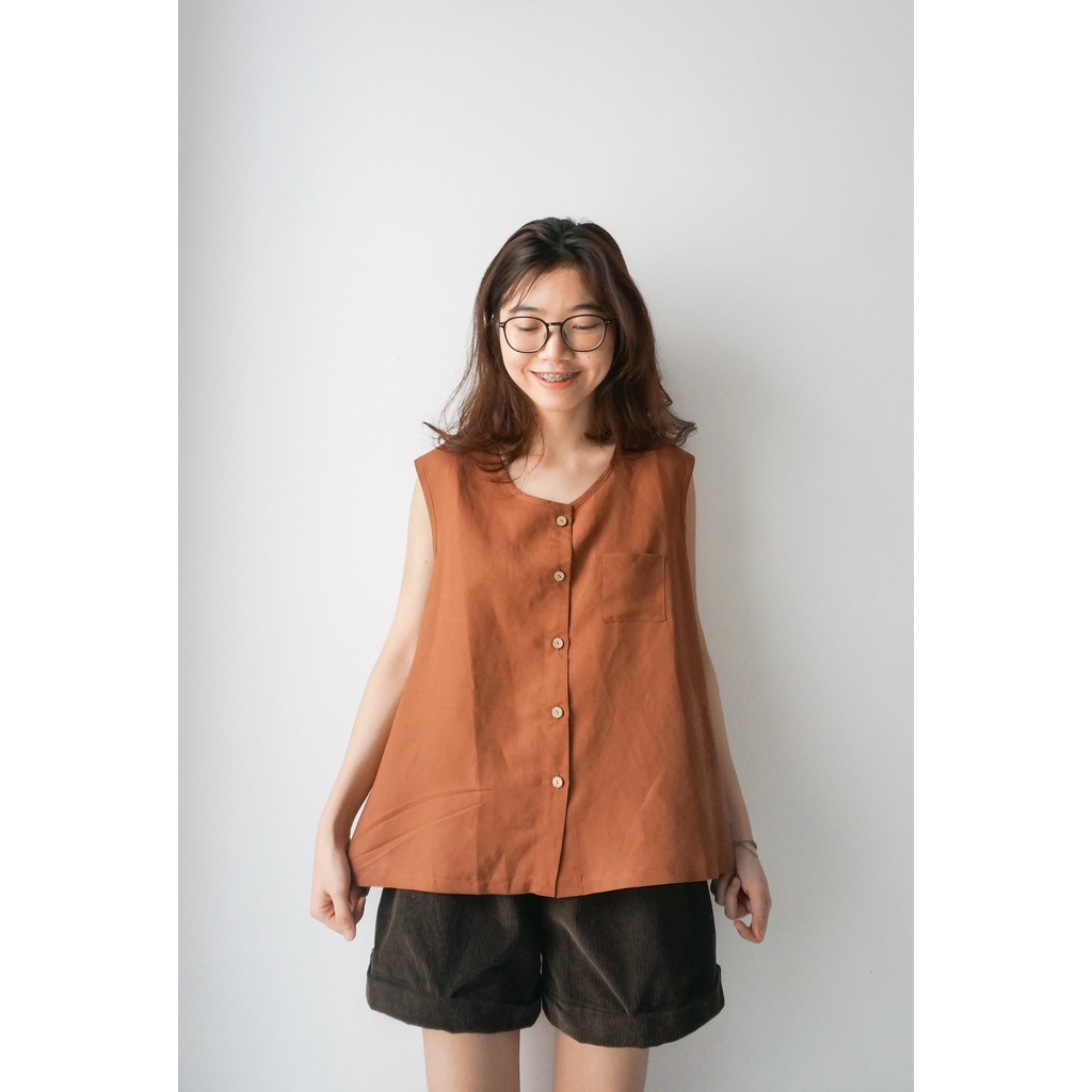 Áo sát nách hàng cúc trước