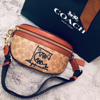 Túi bao tử Coach tròn nâu da thật