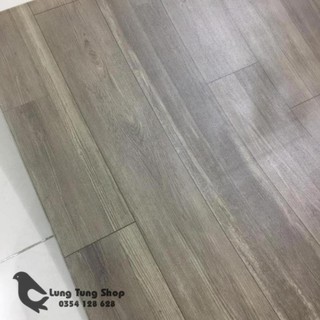 Thảm nhựa simili trải sàn vân gỗ xám - bề mặt nhám hiện rõ vân gỗ như thật