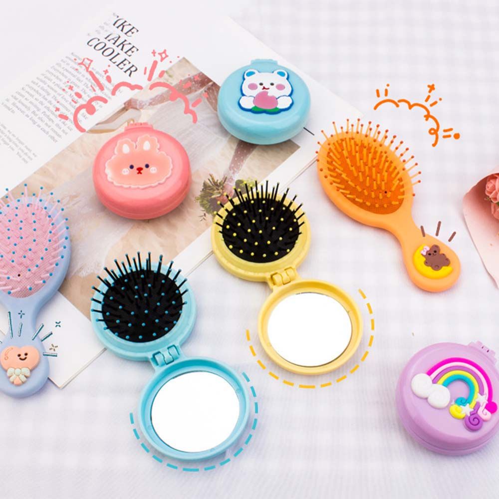 Lược chải tóc mini hình tròn gấp gọn kèm gương soi mát xa da đầu chống tĩnh điện thiết kế dễ thương