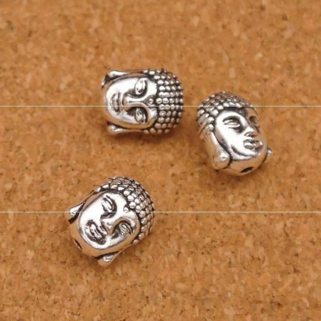 Charm xỏ hình đầu phật size 9x11mm