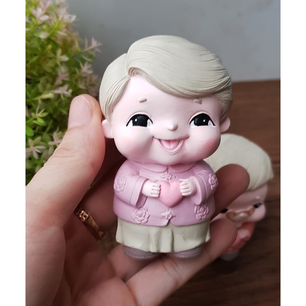 Bộ 02 tượng Ông Bà chibi kèm trứng vàng chữ PHÚC và chân đế tam cấp vuông nhỏ