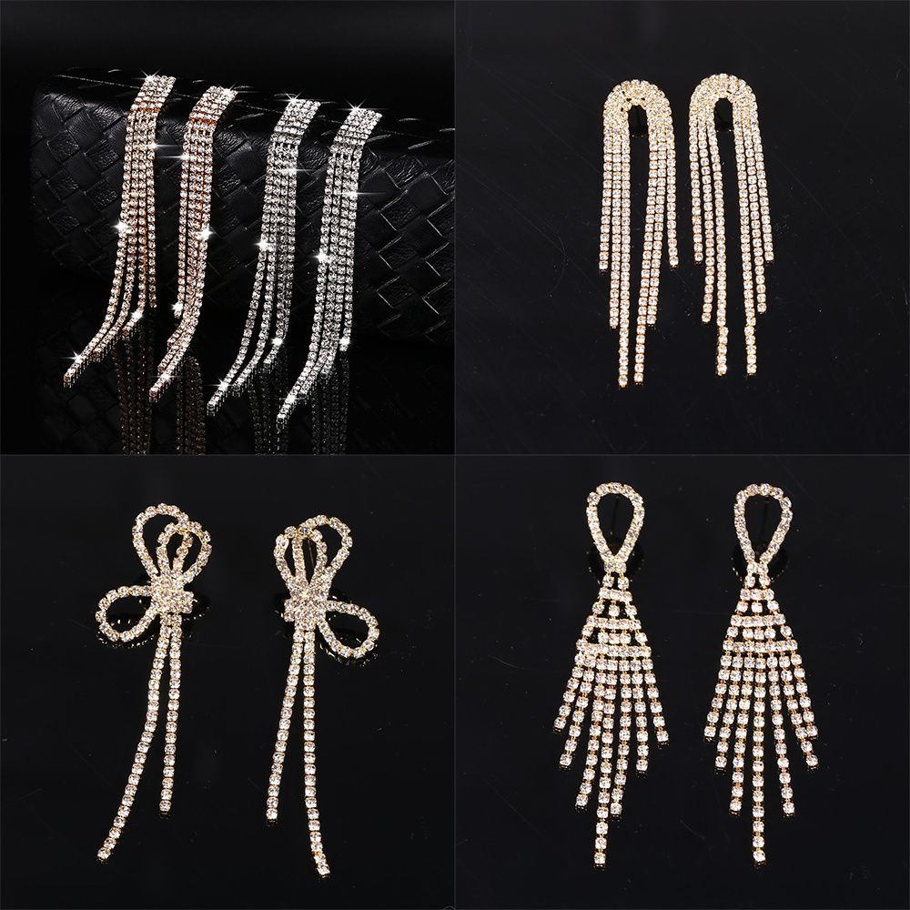 Khuyên tai dáng dài tua rua đính đá sang trọng cho nữ