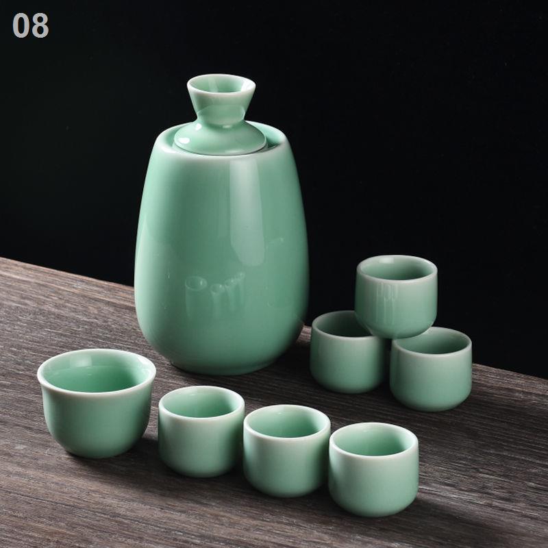 Bình rượu nóng ấm bộ tách gốm vàng hơn trắng ly