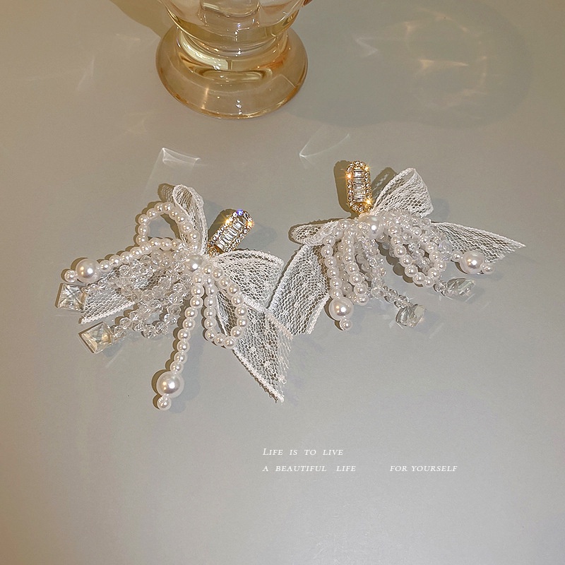 Khuyên tai bạc 925 phối nơ đính đá zircon và ngọc trai nhân tạo thời trang