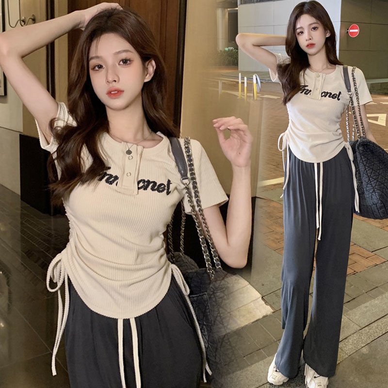 Set đồ UIOWOO gồm áo thun ngắn tay in chữ và quần dài ống rộng thời trang Hàn Quốc