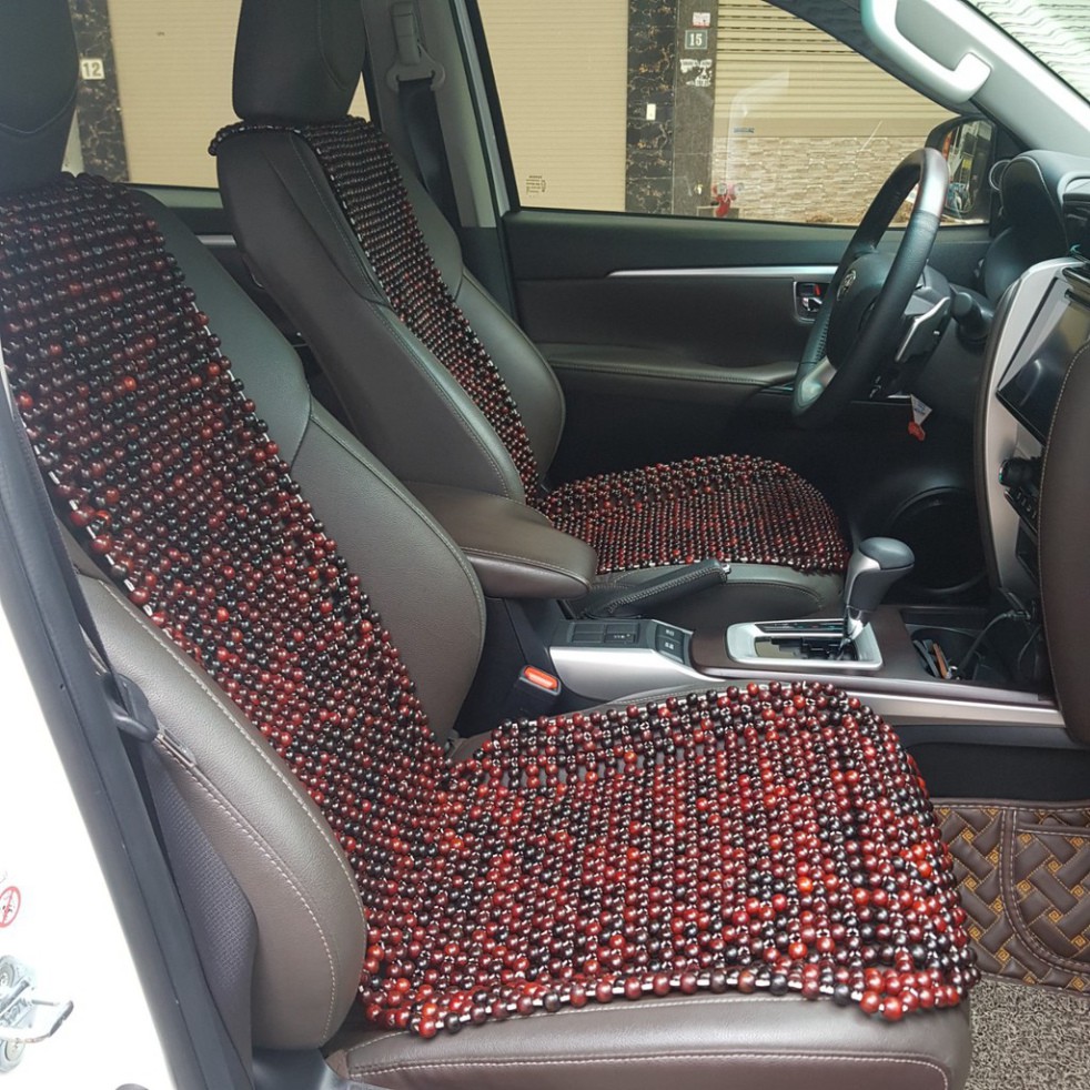 Sản Phẩm Đệm lót ghế ô tô hạt gỗ Cẩm Lai 100% tự nhiên tựa lưng massage trên ô tô .