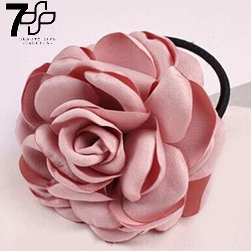 Cột tóc hình bông hoa trà