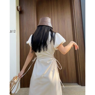 ĐẦM MIDI TAY PHỒNG KHOÉT EO