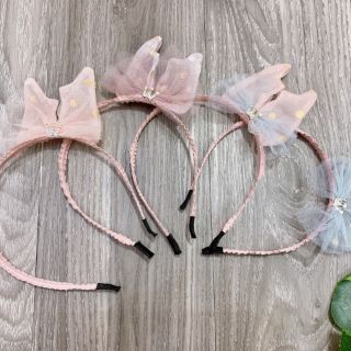 Bờm nơ lệch cho bé gái