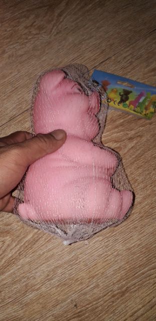 Chú Heo bóp kêu bằng nhựa cầm vàng