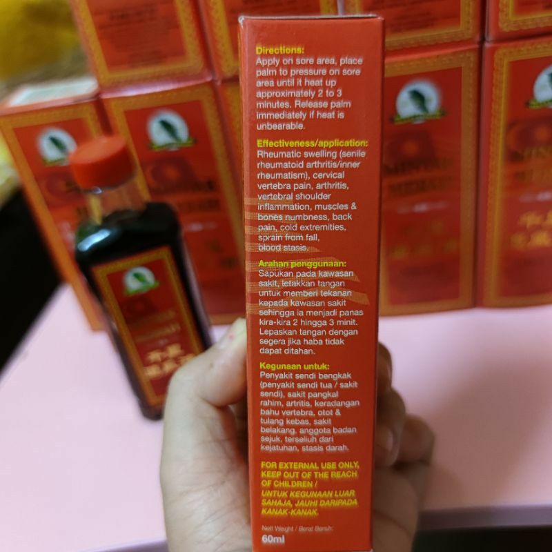 Dầu xoa bóp Minyak Merah đặc biệt