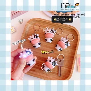 Móc Khóa Balo bò sữa có đèn LED phát sáng kèm tiếng kêu vui nhộn