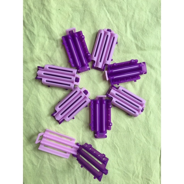 Kẹp dập xù chân tóc bán lẻ