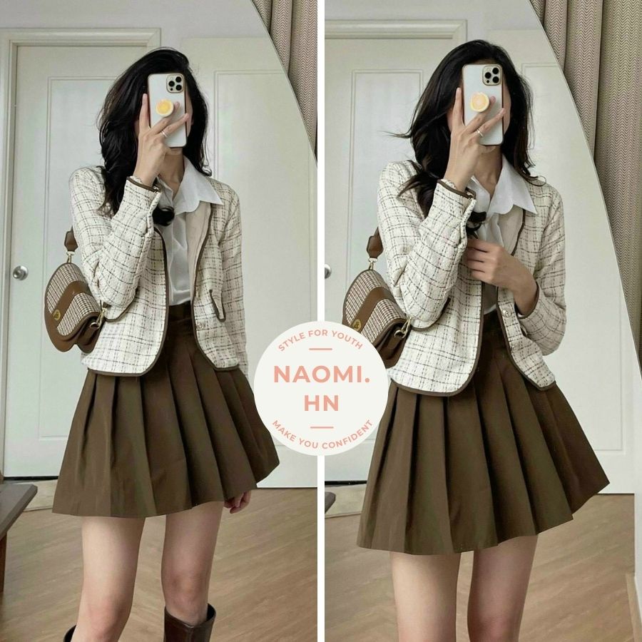 Set áo khoác dạ croptop dài tay viền nâu kèm chân váy tenis nâu ngắn. Áo khoác cadigan dạ kèm chân váy xếp ly.