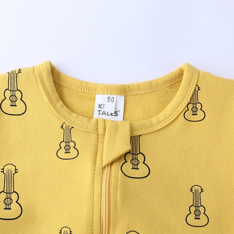 Bộ đồ ngủ áo liền quần tay dài có khóa kéo in hình đàn Guitar dành cho trẻ sơ sinh nam nữ