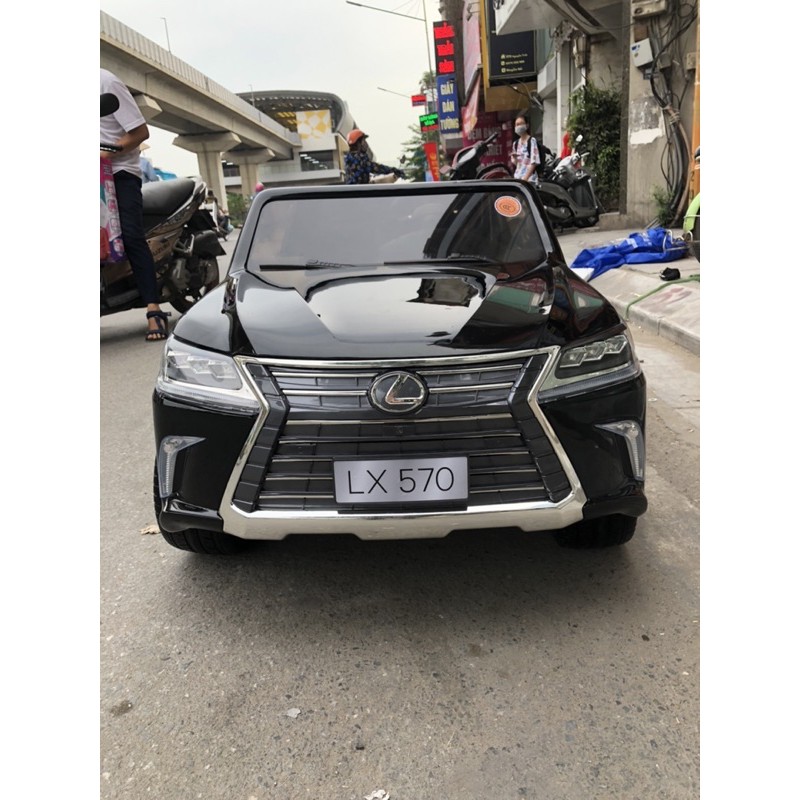 Ô tô điện trẻ em siêu sang Lexus LX570 bánh cao su, ghế da, sơn tĩnh điện( bản quyền Lexus,hàng có sẵn)