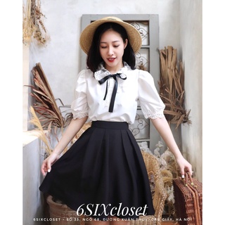 Chân váy công sở dáng lửng xoè ly