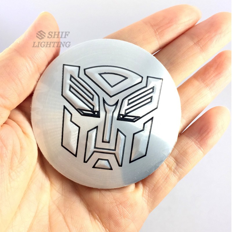 Bộ 4 miếng dán nắp giữa bánh xe hơi họa tiết Transformer 56mm