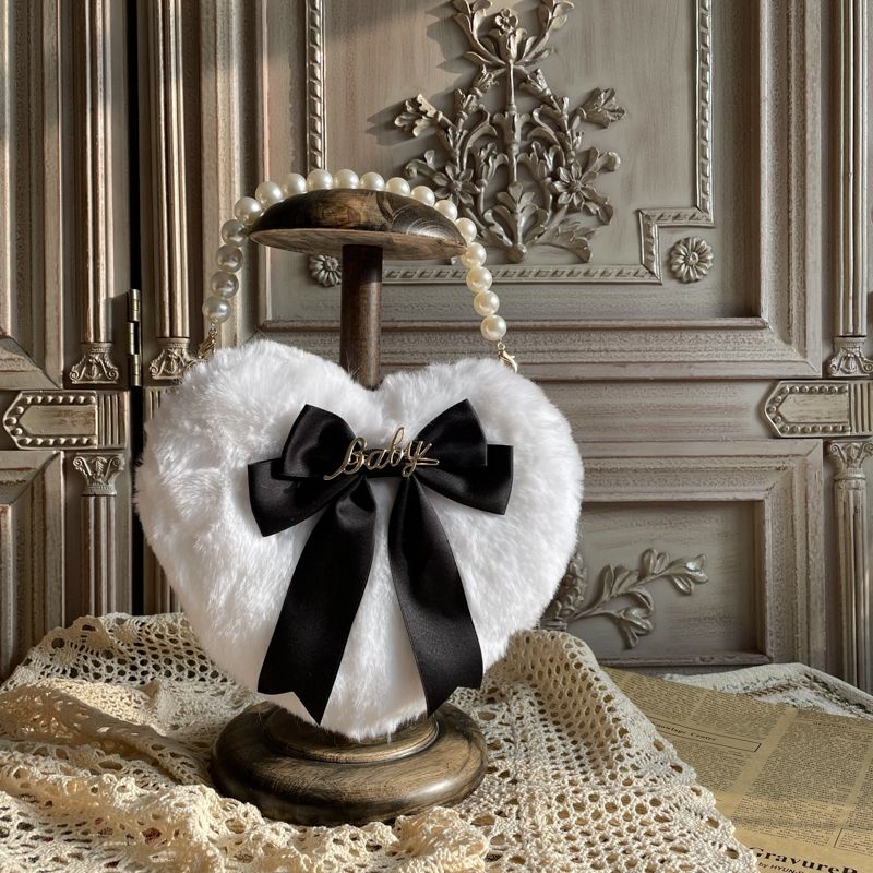 Túi xách lolita trái tim đính nơ baby