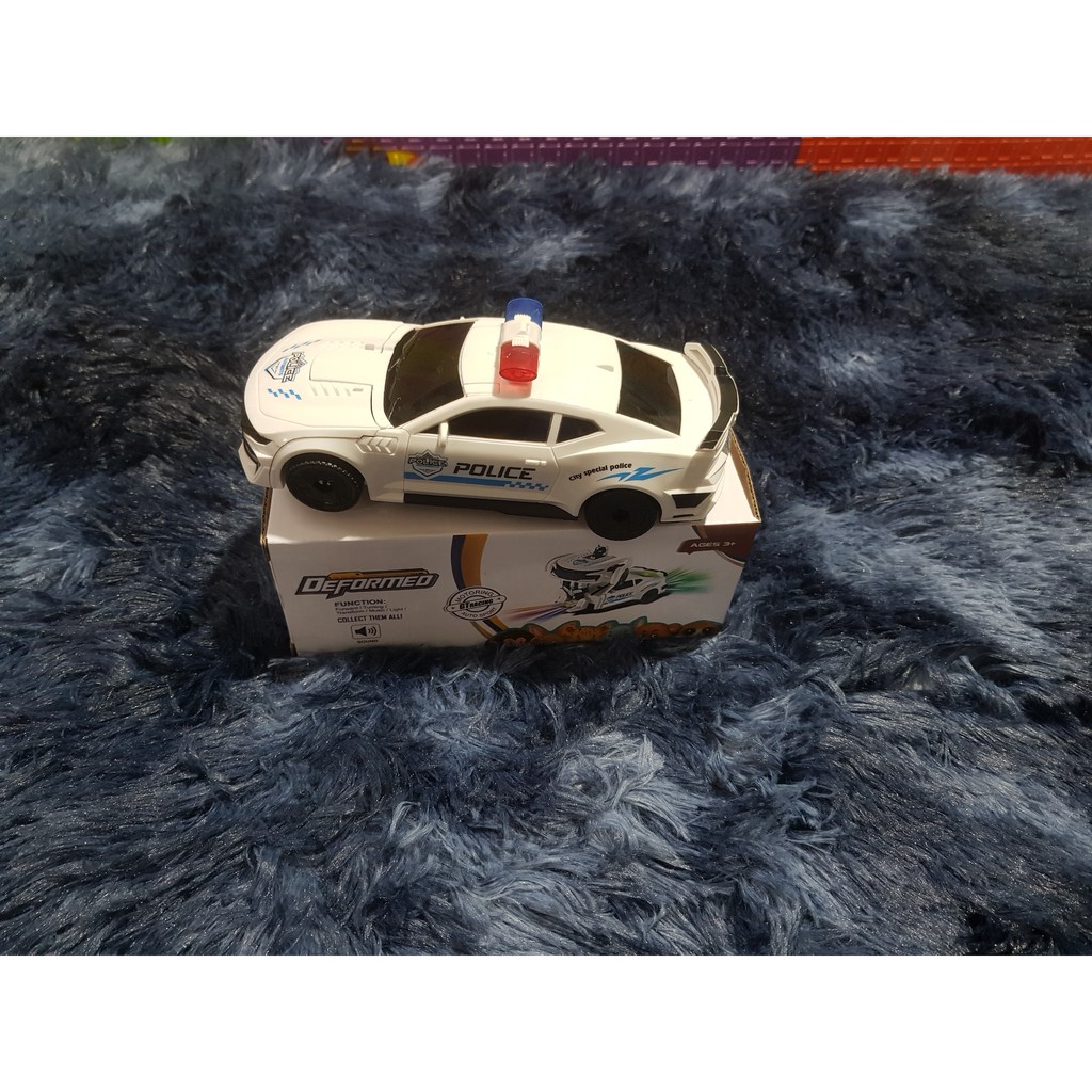 (RẺ KHÔNG TƯỞNG) Trò chơi mô phỏng chiếc xe cảnh sát cầm tay biến hình thành người máy 2 trong 1 có đèn và nhạc cực đẹp