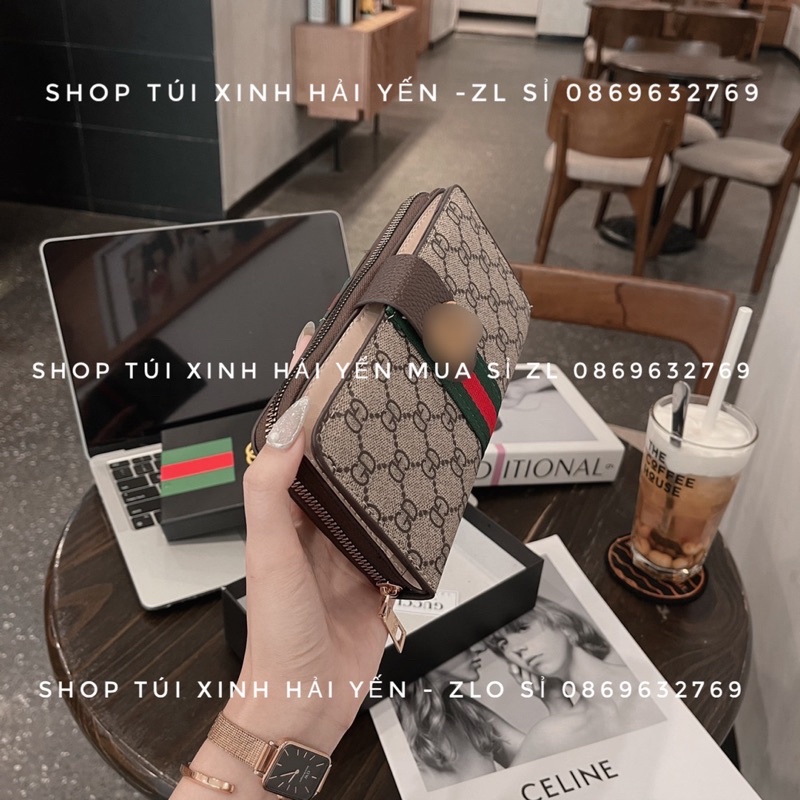Ví dài cầm tay thời trang, tiện dụng lắp bấm logo hoạ tiến kể sọc giữ