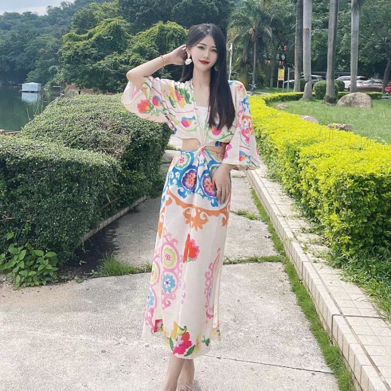 Đầm maxi xoắn eo in hoạ tiết ZR