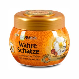 Kem ủ tóc Garnier Ultra Doux Hoa Trà 300ml cho suối tóc suôn mượt