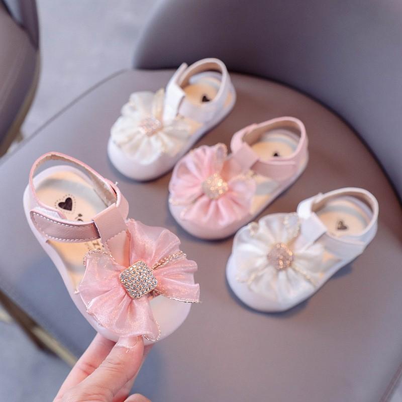 Sandal Nơ Siêu Xinh Mũi Cao Bảo Vệ Chân Bé Cực Mềm Êm Chân
