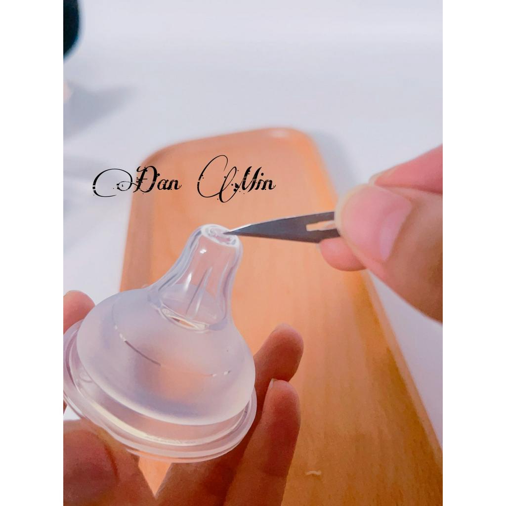 Đục núm ti bình sữa, cây đục lỗ núm ti moyuum hegen pigeon avent.....